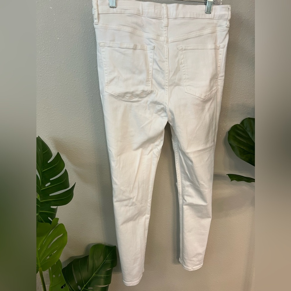 White distressed Free People jeans